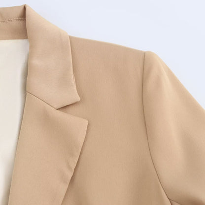 The Casual Long-sleeve Blazer Is Made From A Silk-like Satin Fabric